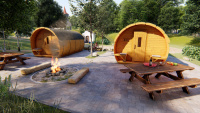 Dřevěná chata či zahradní domek ve tvaru sudu